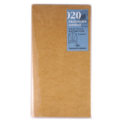 #020 Kraft Folder by Traveler’s Company, a slim kraft-paper insert with two internal pockets, shown sealed in clear packaging with a blue label.