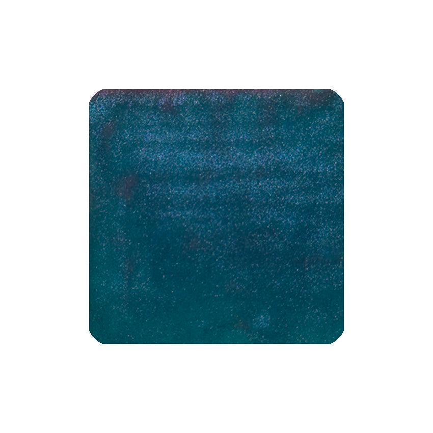 2025 Blue Green Snake (Glistening Purple Blue) ink swatch showing dark teal-blue color with subtle shimmer, highlighting its cosmic inspiration and meticulous craftsmanship.