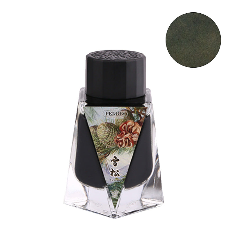 PenBBS No.435 Cedarwood fountain pen ink, 30ml, in a faceted glass bottle with black cap and pine cone label, featuring a muted green ink swatch.