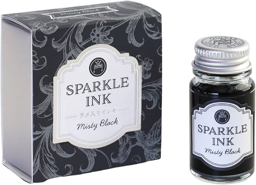 Sparkle Ink Dip Pen Ink - Misty Black (12ml) by Teranishi Chemical Industry, a shimmering black fountain pen ink, in a glass bottle with matching floral-patterned box.