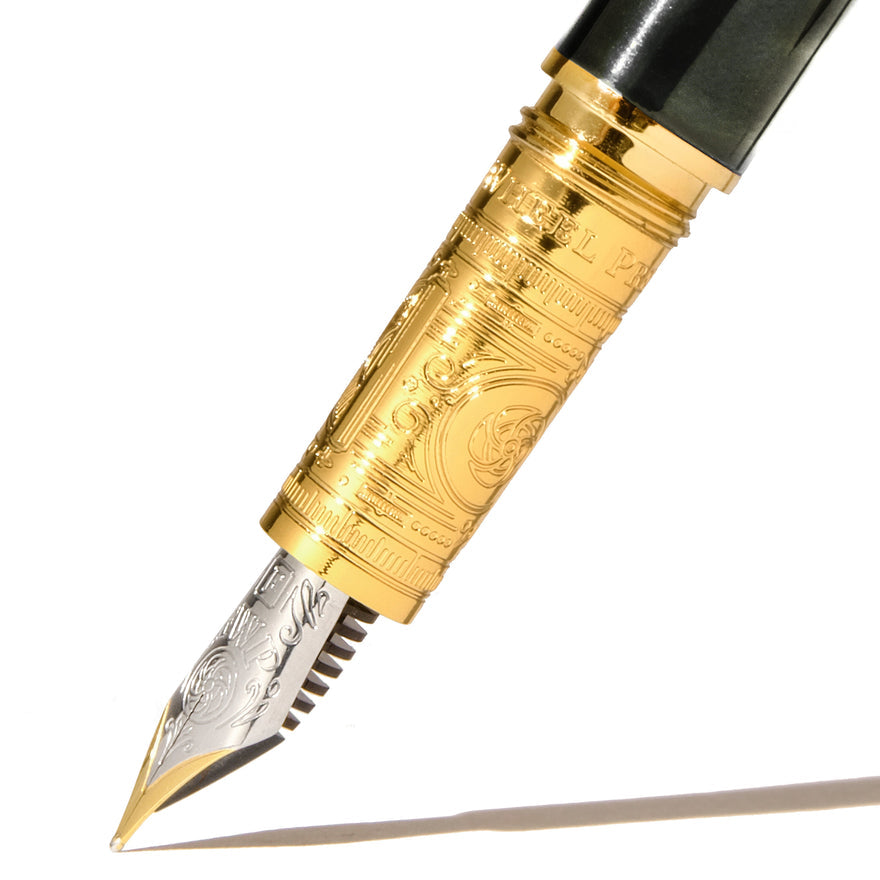 Ferris Wheel Press The Bijou Fountain Pen - Echoes of Eaton (Fine) features an intricately engraved gold-plated grip and two-tone steel nib, showcasing luxury craftsmanship.