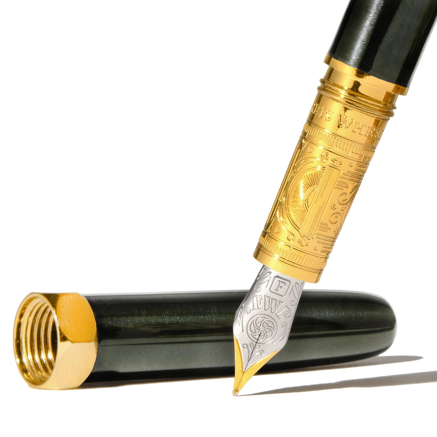 The Bijou Fountain Pen - Echoes of Eaton (Fine) by Ferris Wheel Press, featuring a gold-tone engraved section, two-tone stainless steel nib, and glossy dark barrel.
