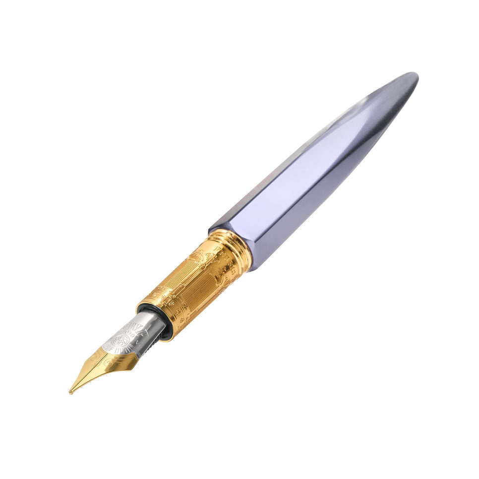 The Marquise Fountain Pen - Pearl Drop Blue (Fine) by Ferris Wheel Press showcases a gold-plated nib and faceted aluminum body, reflecting sophisticated craftsmanship.