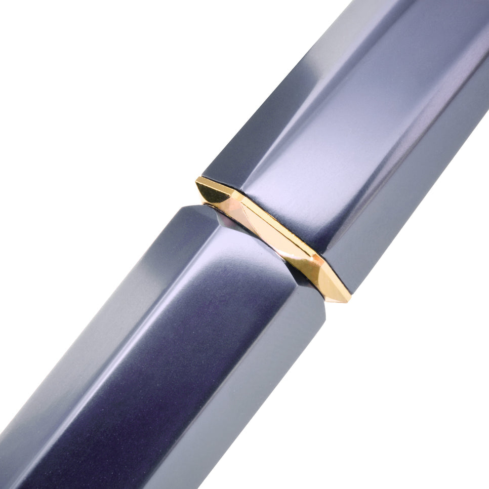 Ferris Wheel Press The Marquise Fountain Pen - Pearl Drop Blue (Fine). Two polished metal shanks with a gold V-shaped insert, showcasing a sophisticated, precision-crafted design.