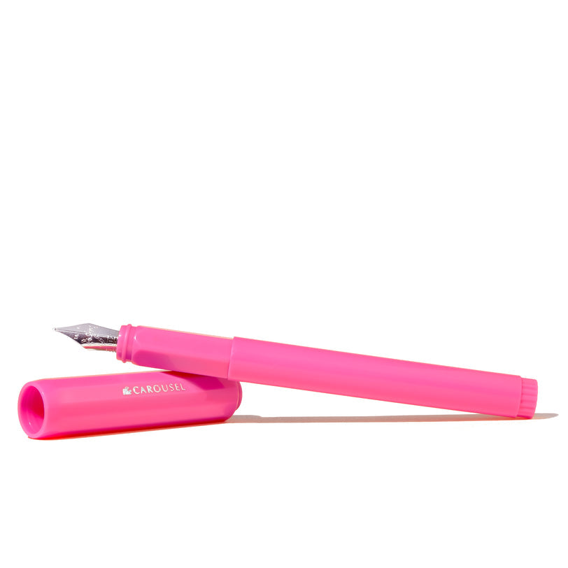 Ferris Wheel Press Carousel Fountain Pen - Malibu Blush (Medium) with a silver nib and matching cap, offering a playful, nuanced writing experience with included ink converter.