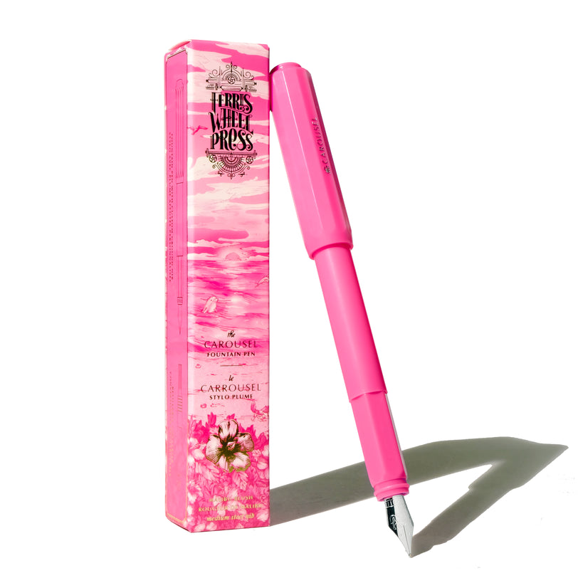 Ferris Wheel Press Carousel Fountain Pen - Malibu Blush (Medium), featuring a tactile plastic body, snap-cap design, and decorative packaging with floral artwork, includes a converter.
