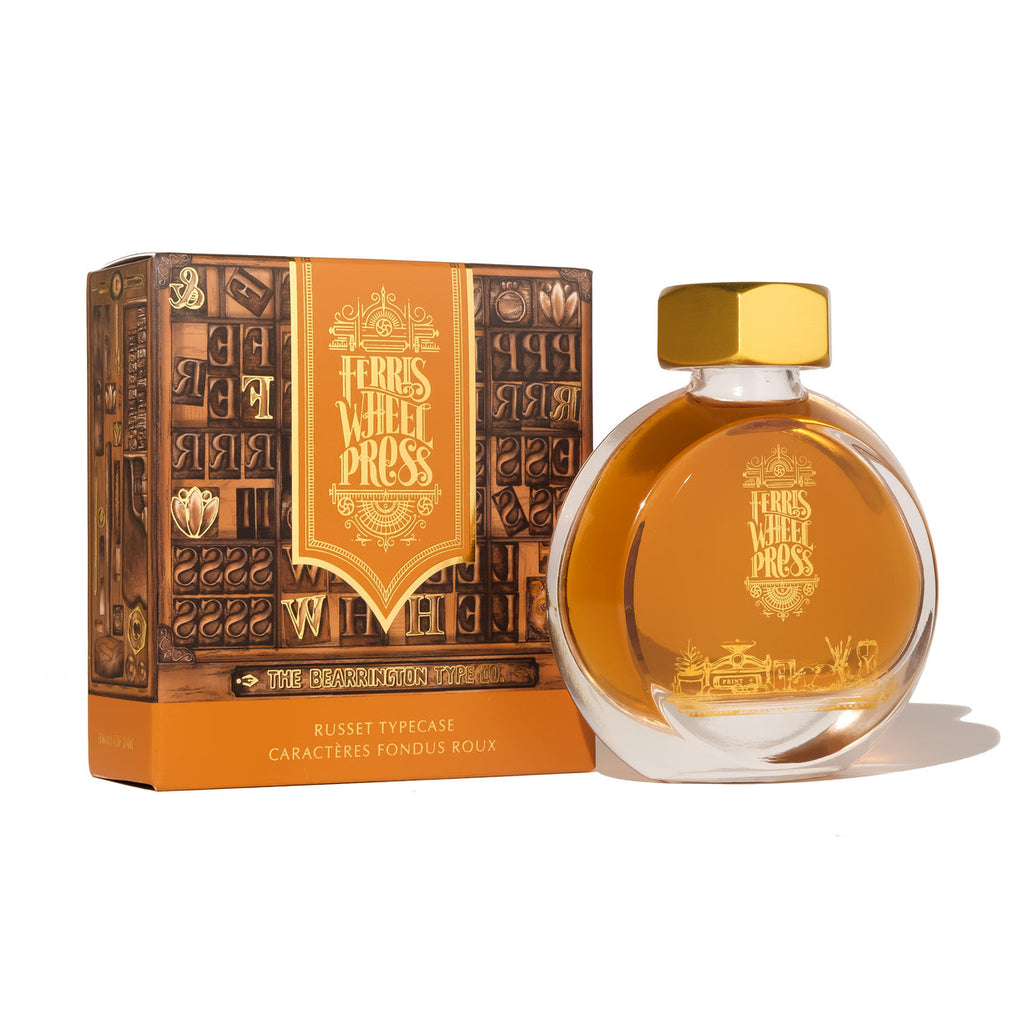 Ferris Wheel Press Russet Typecase - 38ml fountain pen ink in a round glass bottle with gold cap, packaged in an orange-brown display box.