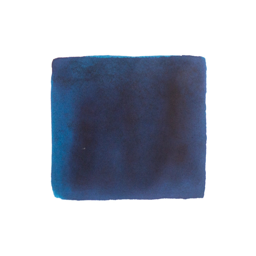KWZ Ink's IG Blue #6, a 60ml iron gall-based fountain pen ink, shown as a dark blue swatch with subtle tone variations on white.