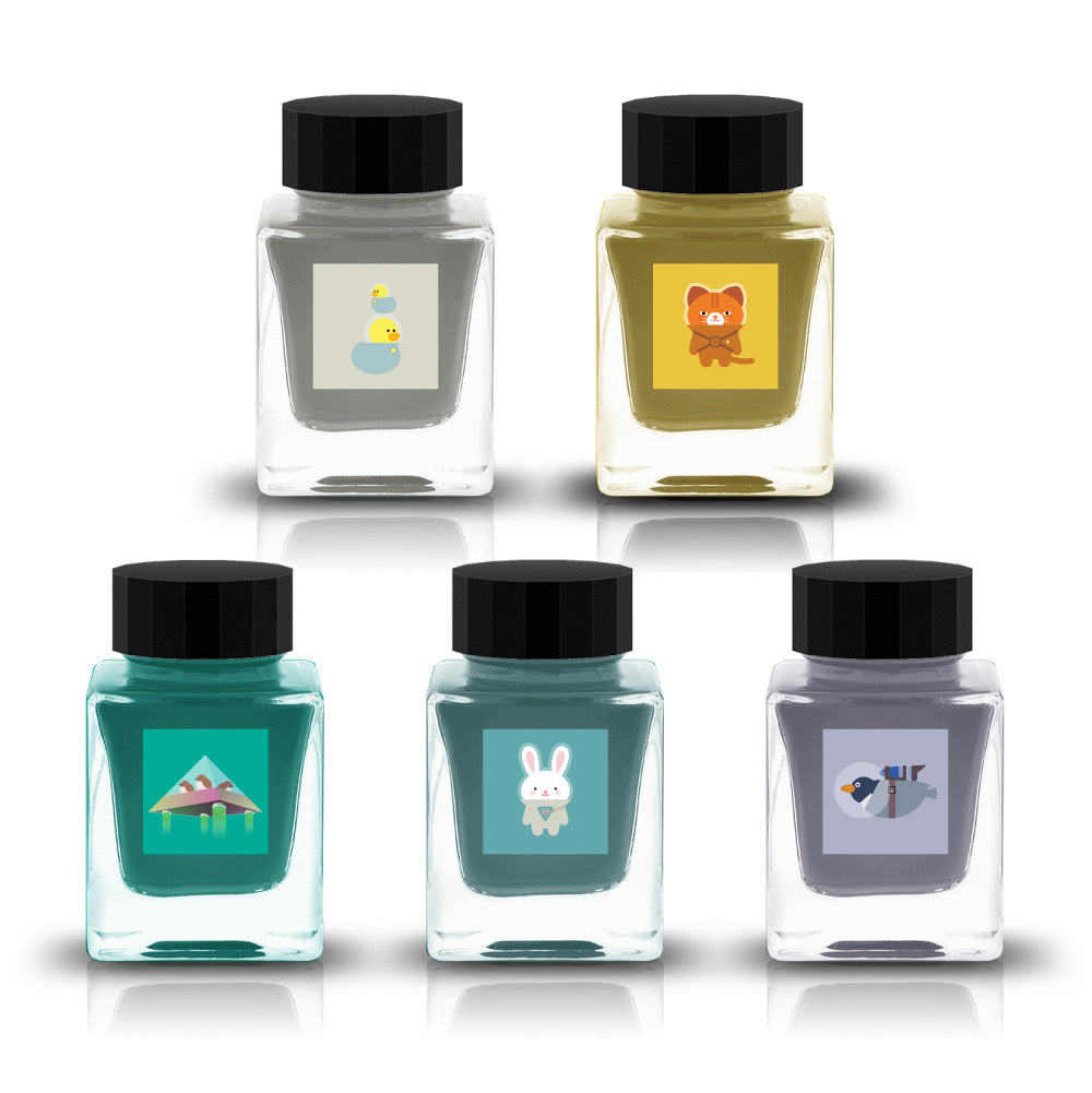 Tono & Lims Gachapon Series Season 6 fountain pen ink bottles featuring five inks with whimsical character labels, including a cat, ducks in space suits, alien in spaceship, rabbit in space suit, and pheasant wearing a rocket backpack, displayed in square glass bottles with black caps