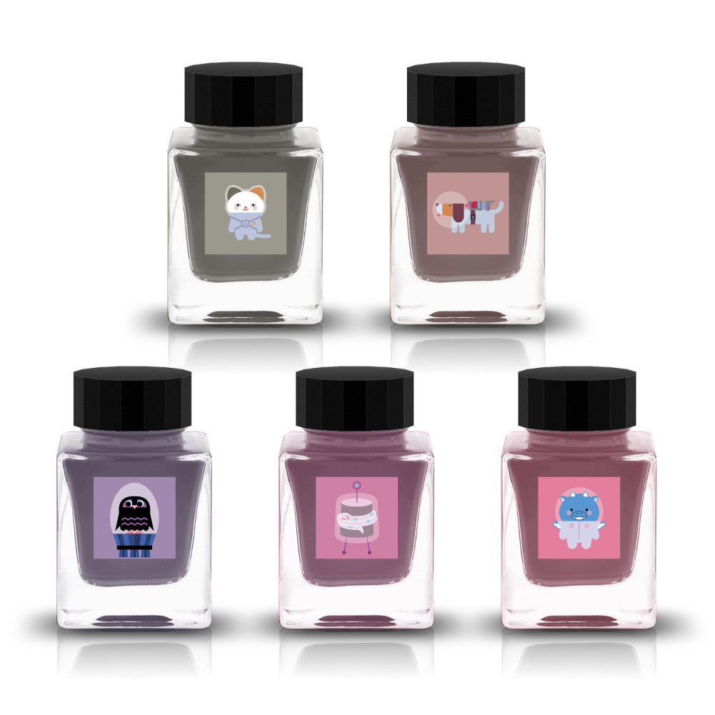 Tono & Lims Gachapon Series Season 6 fountain pen ink bottles featuring five inks with whimsical character labels, including a cat, colorful dog with rocket backpack, owl in space capsule, snake in robot suit, and blue creature in a dinosaur suit, displayed in square glass bottles with black caps