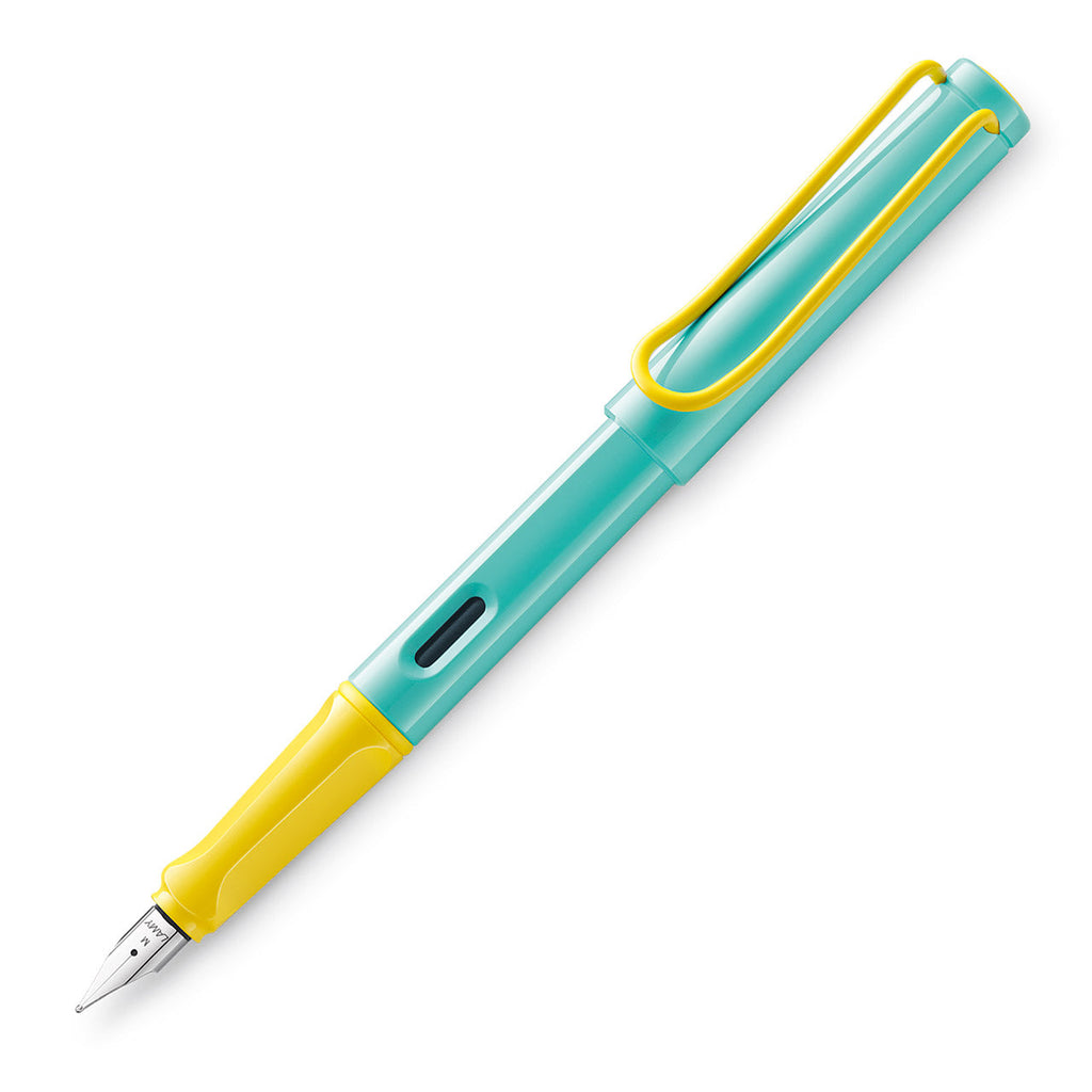 LAMY Safari (Pina Colada) fountain pen with turquoise body, yellow grip and clip, fine stainless-steel nib. Includes blue ink cartridge. Special edition, vibrant design.