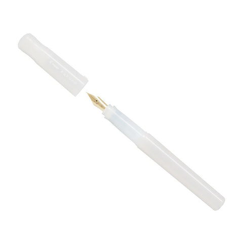 Pilot Kakuno Madoromi - Ivory - Medium (LE) fountain pen with a white translucent body and exposed gold-tone nib, designed for beginners, showcasing its elegant craftsmanship.