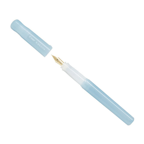 Pilot Kakuno Madoromi fountain pen, light blue, medium nib, with exposed gold-colored nib, showcasing its plastic body and durable stainless steel construction.
