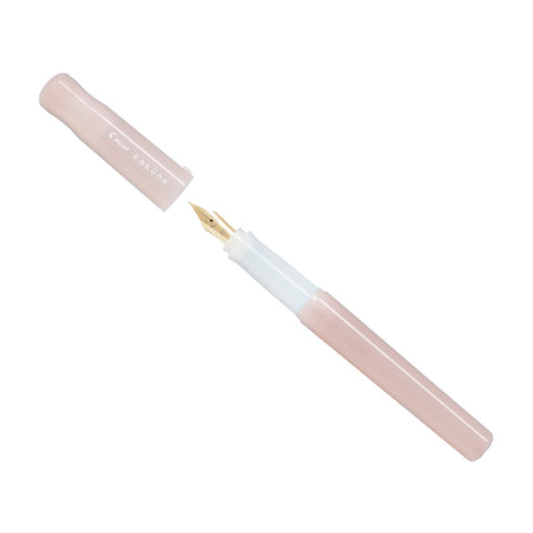 Pilot Kakuno Madoromi - Pink - Fine (LE) fountain pen with gold-tone nib, cap removed. Limited edition starter pen with durable stainless steel nib.