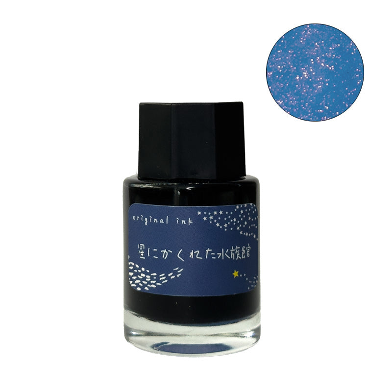 Ka-Ku Ink Mazeru / Aquarium Hidden in the Stars (Shimmer) - 18ml fountain pen ink in a glass bottle, featuring deep blue with pink shimmer.