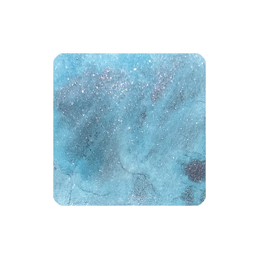 Tono & Lims Aries (Shimmer) fountain pen ink, 30ml, features a swirling blue base with silver sparkles, ideal for creative writing projects.
