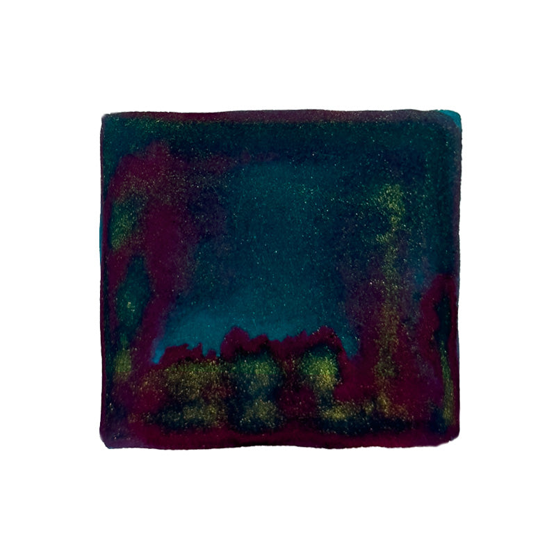 Colorverse 2024 Blue Dragon (Glistening Gold) - 15ml fountain pen ink, showcasing a color-shifting sample swatch with teal, green, gold, and burgundy hues under different lighting.