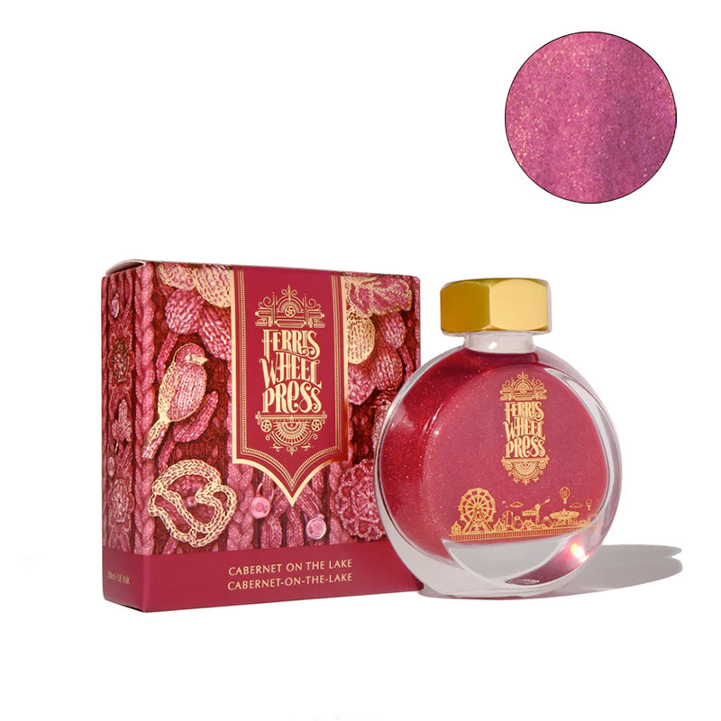 Ferris Wheel Press Cabernet on the Lake fountain pen ink, 38ml round glass bottle with gold cap, showcasing shimmery burgundy-pink hue, and matching retail box.