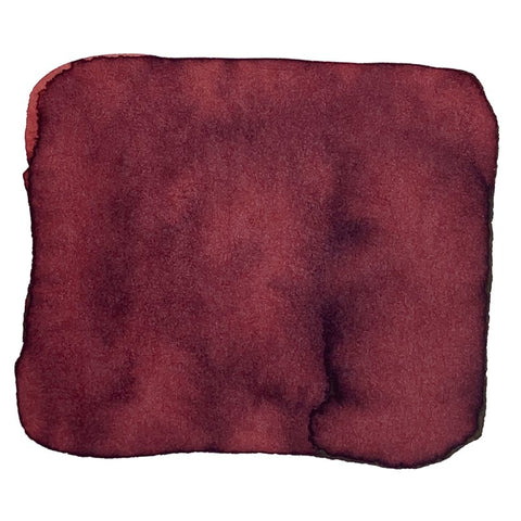 Candy Marsala - 2ml: A deep burgundy watercolor swatch with subtle tone variations and feathered edges, showcasing Ferris Wheel Press's precision in fine stationery.