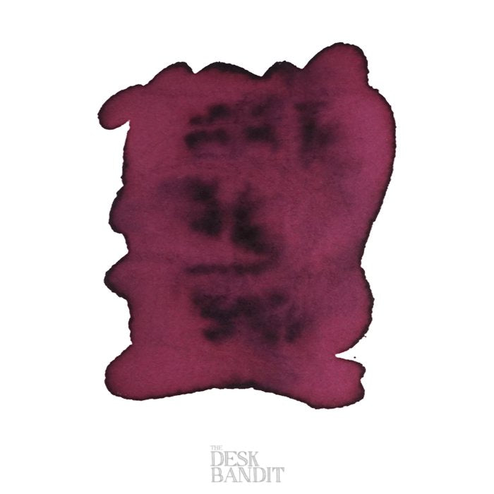 Cherry Blossom - 2ml ink sample showing a deep burgundy swatch with darker sheen areas, labeled with The Desk Bandit's watermark on white paper.