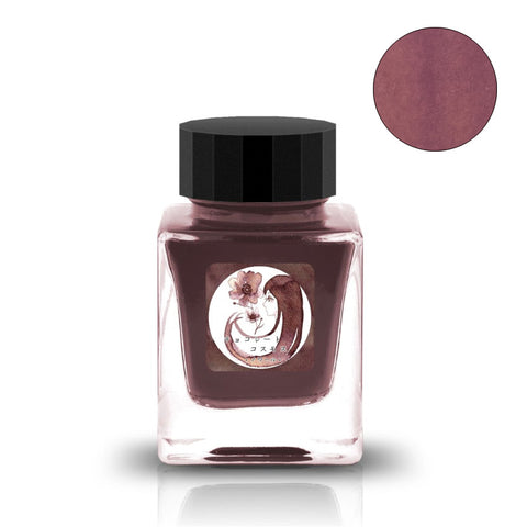 Chocolate Cosmos Noir fountain pen ink by Tono & Lims, 30ml. Features deep brown-reddish hue, stylized label with a woman's profile and cosmos flower.