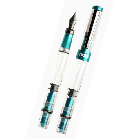 TWSBI Diamond 580 ALR (Caribbean with Onyx) - Extra Fine fountain pen, featuring a clear body with visible piston mechanism, shown in uncapped and capped positions.