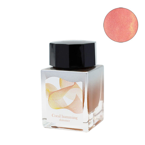 Dipton Ink Coral Humming - 20ml by Sailor, a shimmering coral-pink fountain pen ink in a glass bottle with black cap, ideal for dip pens only.