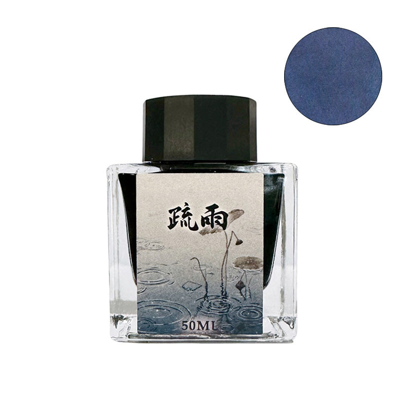 Moonman/Majohn Drizzle fountain pen ink, 50ml glass bottle with a deep blue/navy swatch, featuring a label depicting rain over lotus leaves.