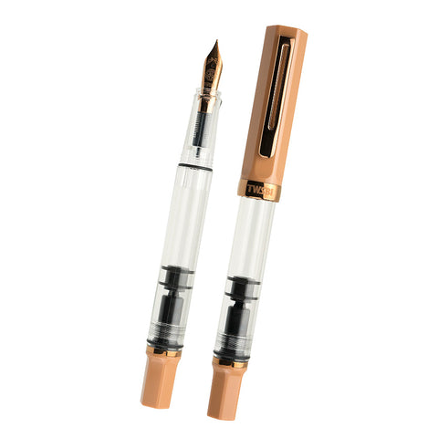 TWSBI ECO fountain pen in Caffe/Bronze, featuring a Stub 1.1 nib, clear barrel, and piston fill mechanism. One pen is capped, the other uncapped, revealing the nib.