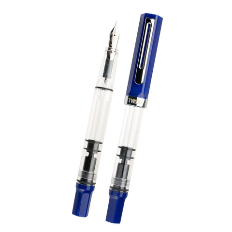 TWSBI ECO (Dark Sapphire) fountain pen, broad nib, showcasing clear barrel and bright blue cap; one pen capped, one uncapped revealing metal nib.