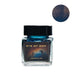 Eye of God (Shimmer) - 30ml fountain pen ink by Journalize, featuring deep midnight-blue with shimmering bronze flecks, in a square glass jar with a cosmic-themed label.