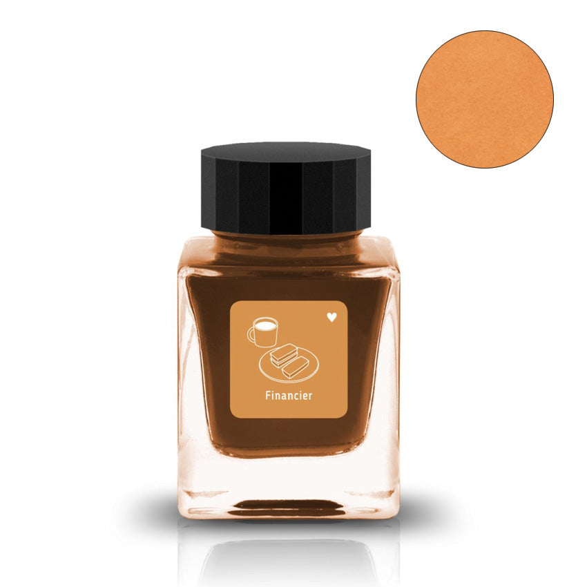 Tono & Lims Financier - 30ml fountain pen ink in a square glass bottle, inspired by financier cake. Warm tan-brown dye-based ink with coffee cup and pastry label icon.