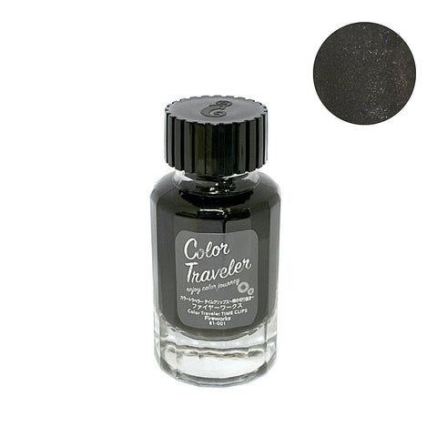 Color Traveler Fireworks (Shimmer) - 30ml fountain pen ink in a glass bottle, featuring dark ink with shimmer particles. Includes mini bottle, labels, dropper, and travel brochure.