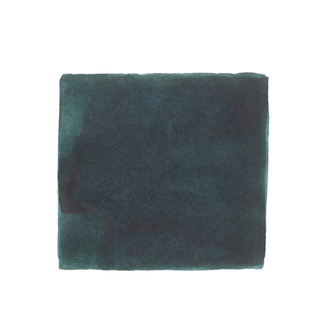KWZ Ink Foggy Green fountain pen ink, 60ml bottle, hand-painted dark teal swatch on white, showcasing unique dye-based color for specialized writing.