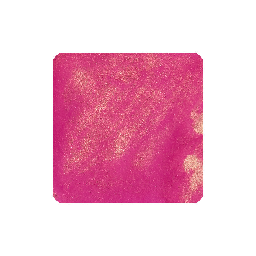 Jacques Herbin Fuchsia de Magellan fountain pen ink, shimmering bright pink, 50ml, from the 1670 Collection. Close-up of granular, metallic-flecked texture.