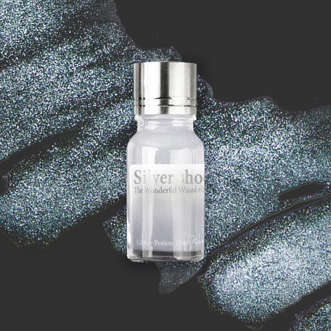 Wearingeul's Silver Shoes (Wizard of Oz) Glitter Potion - 10ml vial; a shimmering silver pigment add-on for fountain pen ink, with a decorative label and shiny metal cap.