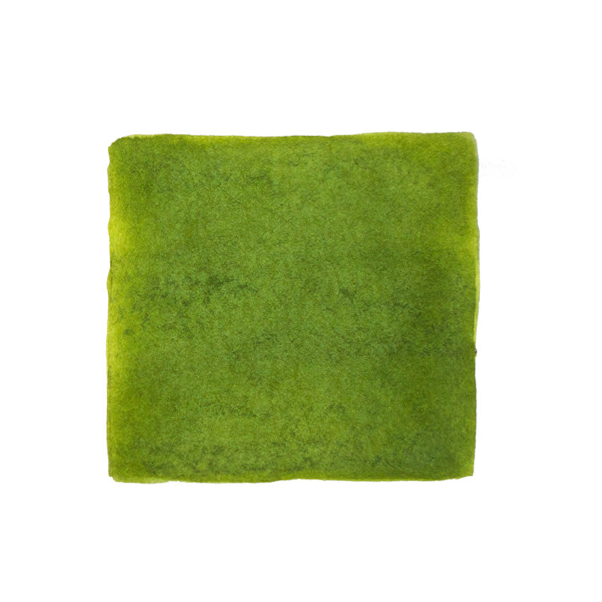 KWZ Ink Green Gold #2 - 60ml fountain pen ink, showcased with a square swatch of bright green, fuzzy material resembling felt or artificial moss.