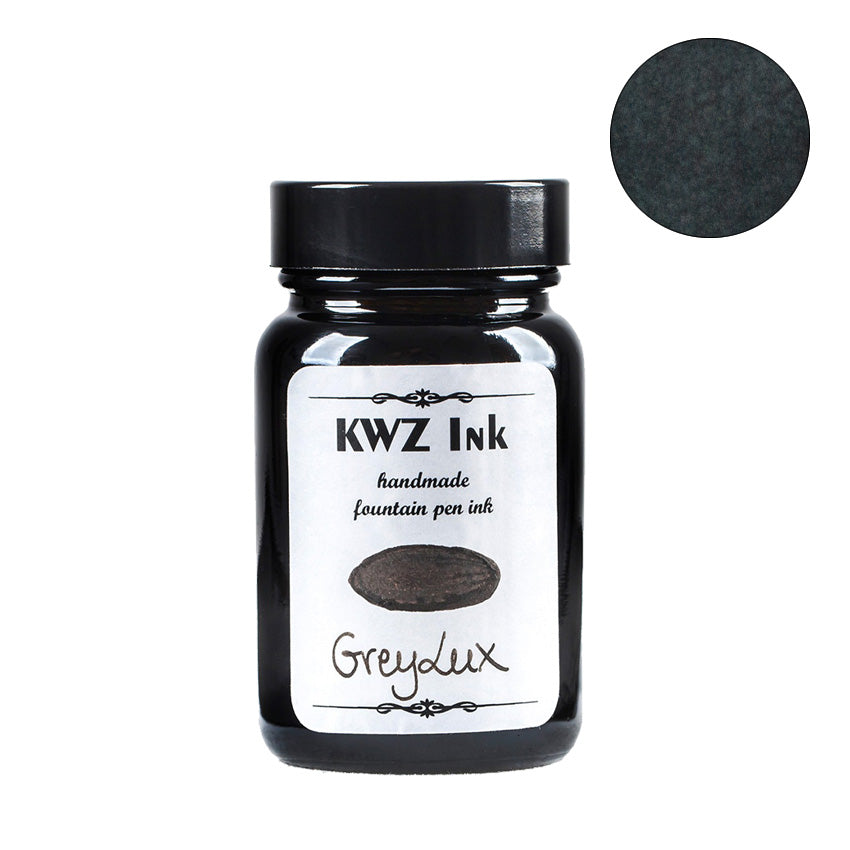 KWZ Ink Grey Lux fountain pen ink, 60ml bottle, showing a round swatch of its dark grey shade, highlighting Desk Bandit's unique writing supply collection.
