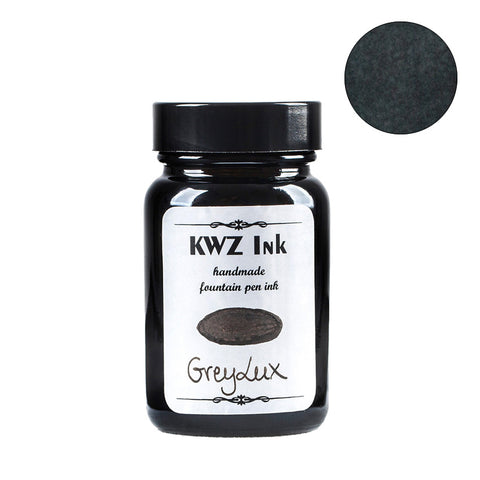 KWZ Ink Grey Lux fountain pen ink, 60ml bottle, showing a round swatch of its dark grey shade, highlighting Desk Bandit's unique writing supply collection.
