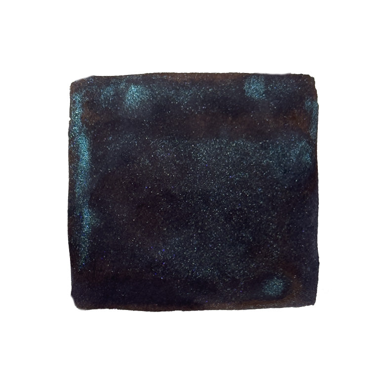 Wearingeul Hades (Shimmer) - 30ml fountain pen ink with a velvety black applicator sponge, known for its unique shimmering effects and literary inspiration.