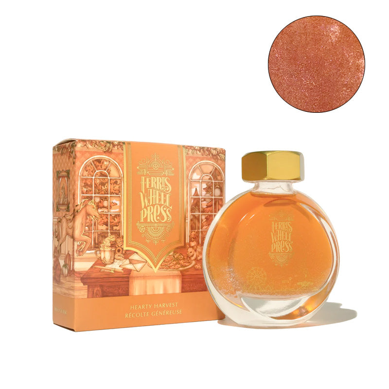 Ferris Wheel Press Hearty Harvest (Shimmer) - 38ml fountain pen ink in a round glass bottle with gold cap, featuring a warm coppery-orange shade and decorative orange box.