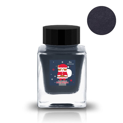 Tono & Lims Holy Night - 30ml fountain pen ink in a square glass bottle, featuring a Santa motif and dark navy shade, celebrating their 6th anniversary.