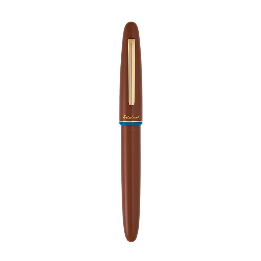 Esterbrook Estie Incredible Rock fountain pen with gold trim, broad nib, and brown cap, reflecting 1970s retro charm and modern craftsmanship.