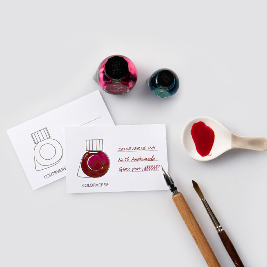Ink Swatch Cards - Size B (Swatch) by Colorverse, featuring fountain pen ink and drawing tools, including cards, glass bottles, porcelain spoon, dip pen, and paintbrush.