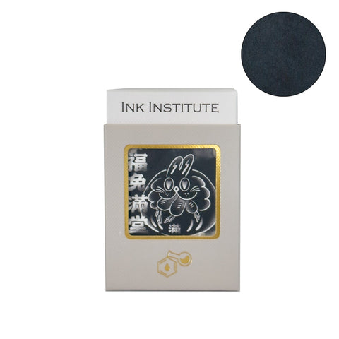 Ink Institute Lucky Bunny - 30ml fountain pen ink. Box features a gold-foil window with a rabbit illustration. Ink color is very dark charcoal/black. Limited release.