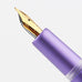 Moonman M2 Plus (Purple) - Fine fountain pen featuring a gold-tone nib, attached to a purple grip section, showcasing the intricate ink feed fins.