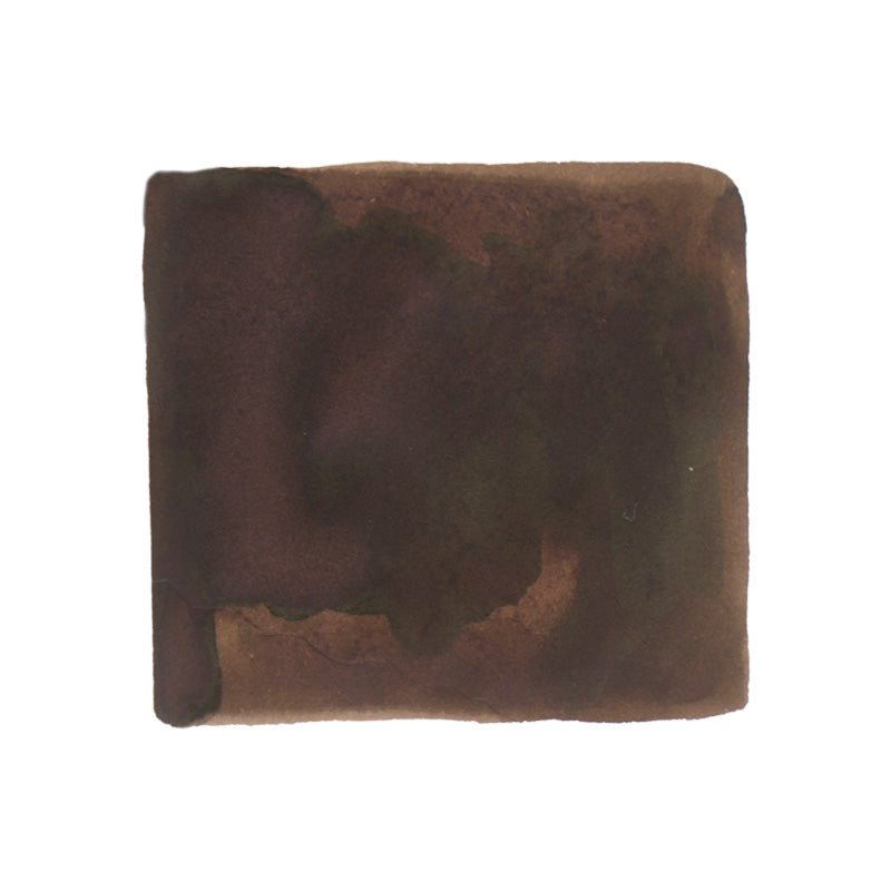 Kuretake Art Nouveau - Mahogany Brown fountain pen ink, 20ml. The swatch reveals a rich, dark brown watercolor-like texture with tonal variations, perfect for artistic expression.