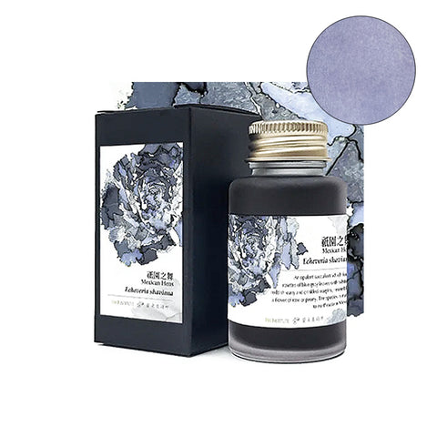 Ink Institute Mexican Hens fountain pen ink, 30ml bottle with gold cap, features a blue-purple floral motif and soft violet-gray color swatch.