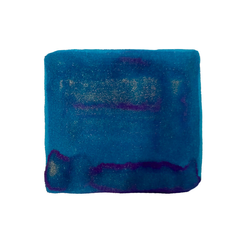 Mid Field Glaze (Shimmer) - 15ml by Ban Mi Stationery: A blue fountain pen ink swatch with indigo shading, showcasing its high sheen qualities.
