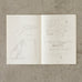 MD Notebook Light – B6 Slim Grid (3 Pack) on concrete, open to creative sketches and notes, showcasing its suitability for brainstorming, sketching, and idea development.